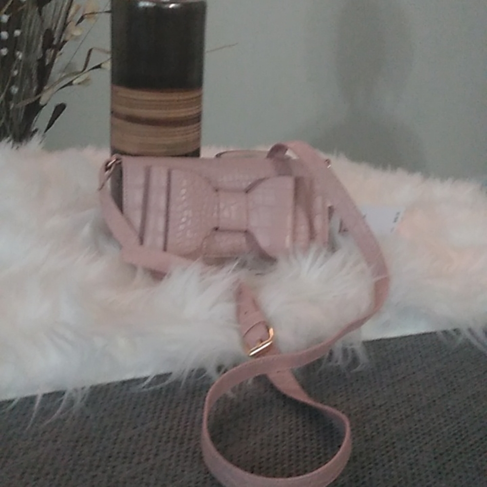 Light pink pocketbook